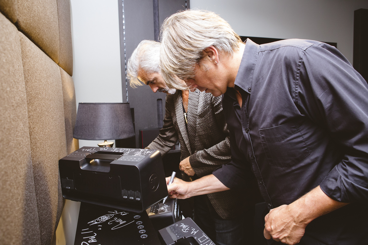 Members of Triggerfinger sign Teufel Boomsters