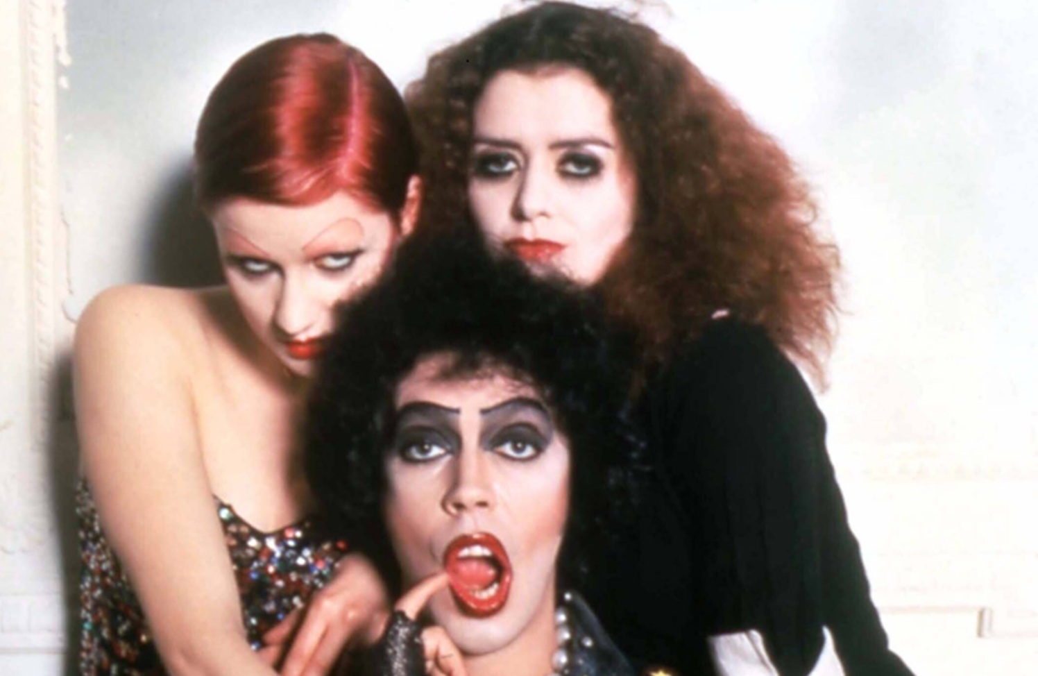 THE ROCKY HORROR PICTURE SHOW NELL CAMPBELL aka LITTLE NELL, TIM CURRY as Dr Frank-N-Furter, PATRICIA QUINN THE ROCKY HORROR PICTURE SHOW Date: 1975.